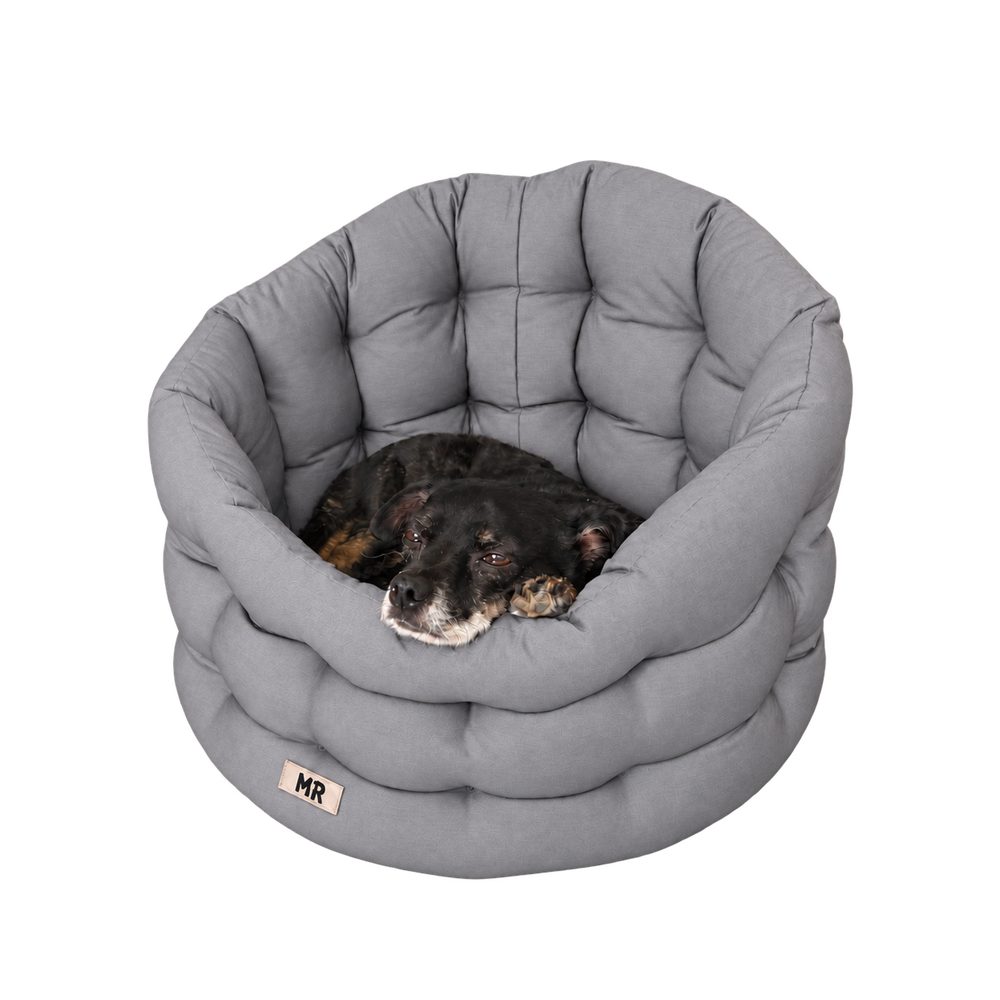 Hundenest von MartinRuetter mit hohem Rand zum ankuscheln in Premiumqualität in deutschland gefertigt und bis 95 C waschbar in hellgrau mit gemütlich liegendem Hund.
