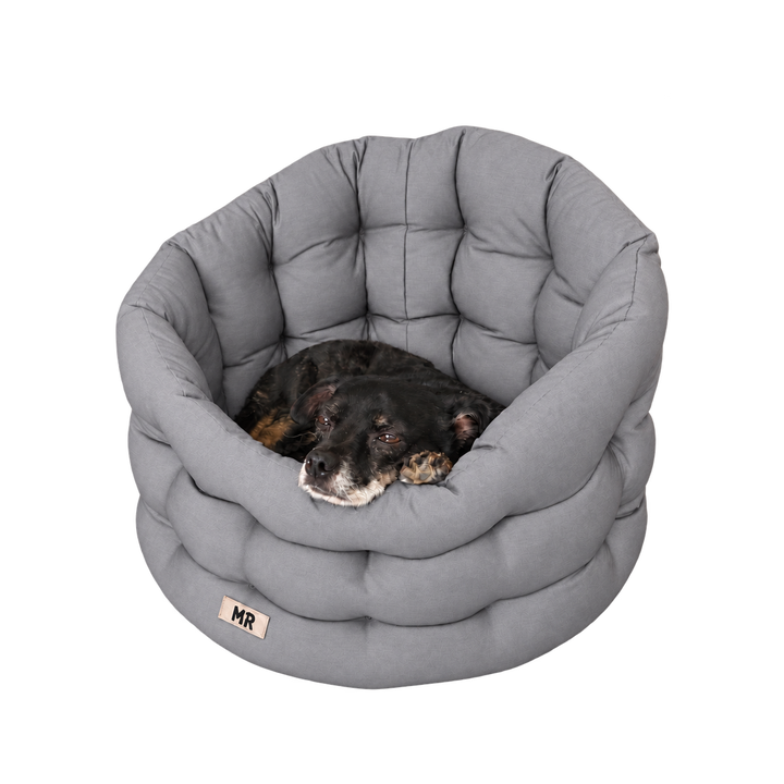 Hundenest von MartinRuetter mit hohem Rand zum ankuscheln in Premiumqualität in deutschland gefertigt und bis 95 C waschbar in hellgrau mit gemütlich liegendem Hund.